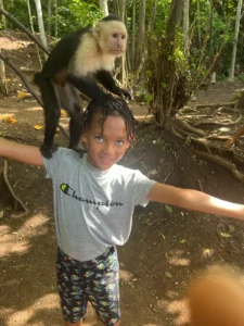 boy-with-monkey-in-jaco-beach